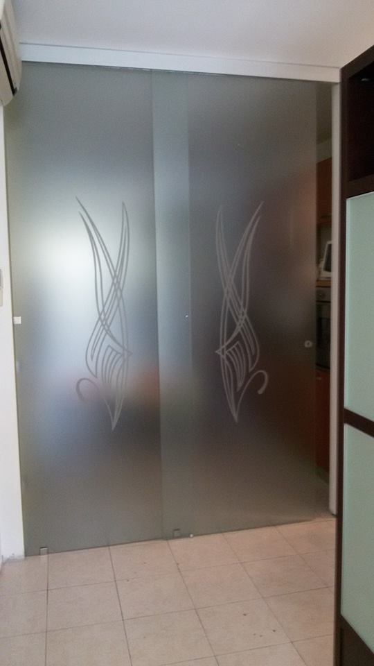porte in vetro immagini stampa serglasstyle arredo arredare ristrutturazione vicenza bergamo verona rovigo reggio emilia porta a vetro scorrevole design immagine stampata vetreria verona vetreria vicenza vetreria arzignano vetreria padova scrigno eclisse porte tuttovetro
