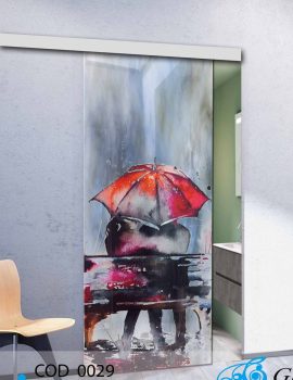 Porta scorrevole in vetro decorata con un'opera d'arte colorata in un ambiente interno.